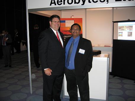 Bob Whetsell, Aerobytes with a visitor to exhibition stand